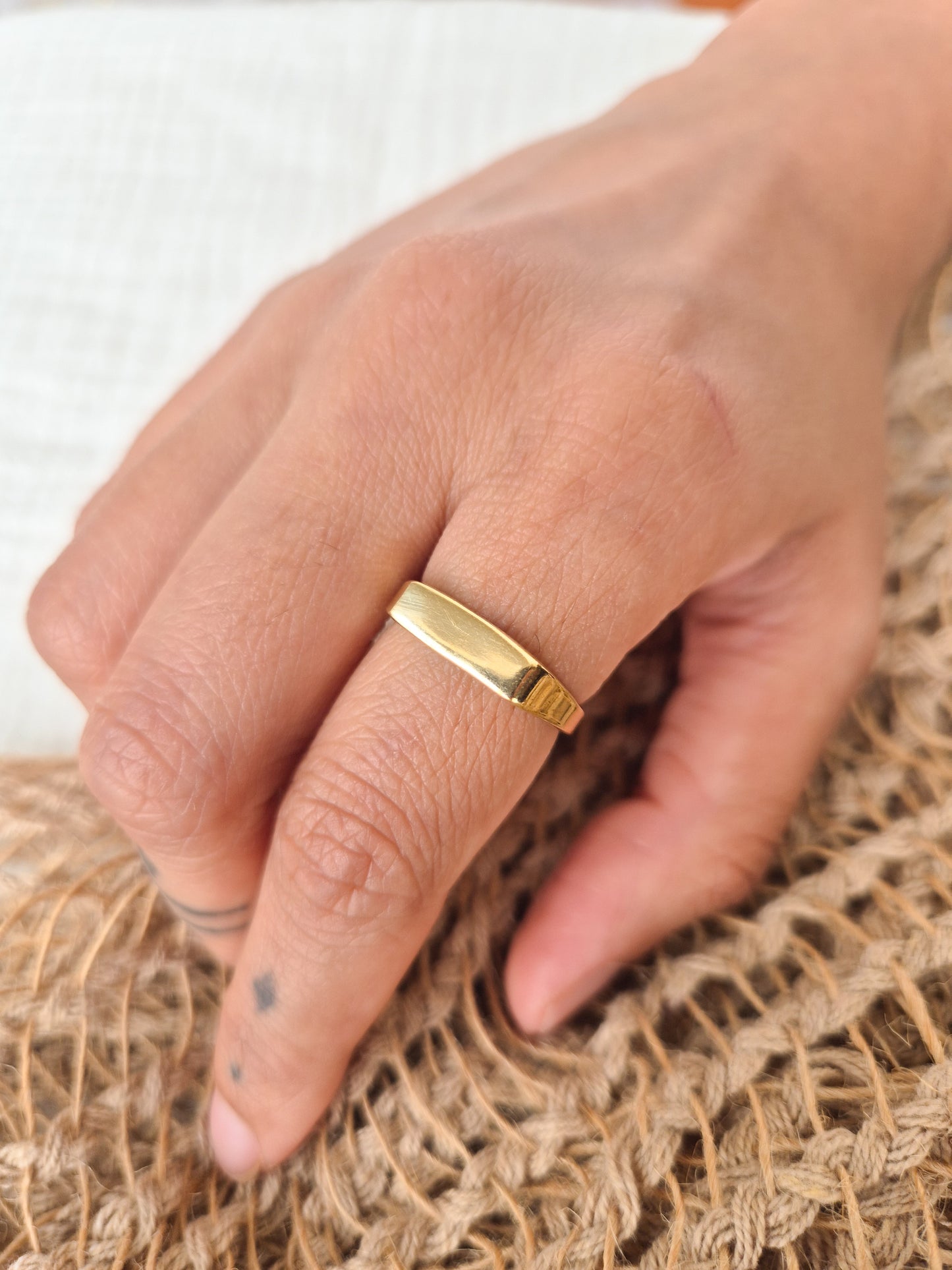 Aadi flat band brass ring