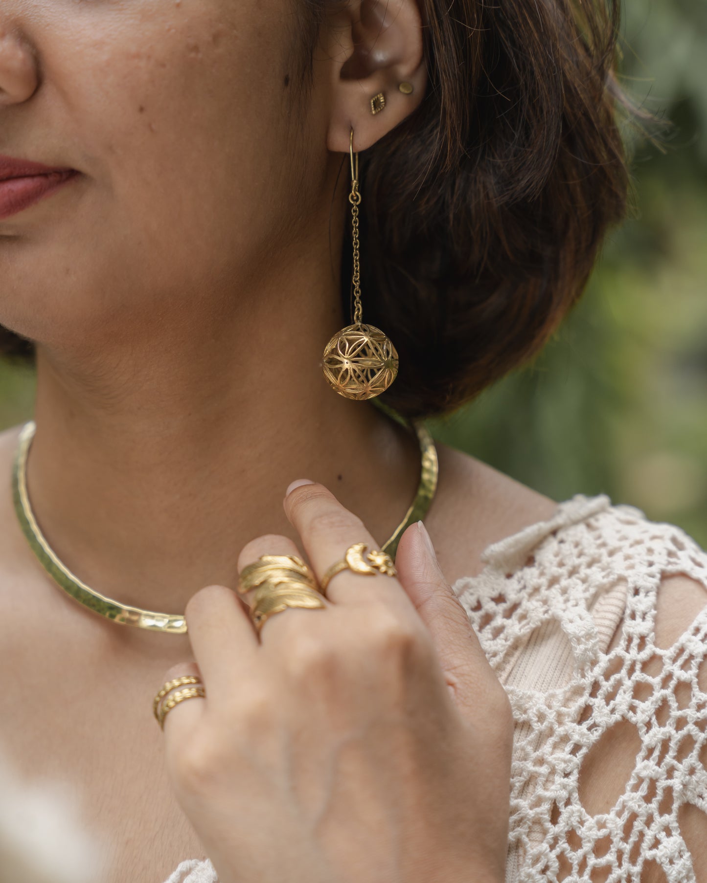 Seed circle dangler brass earrings