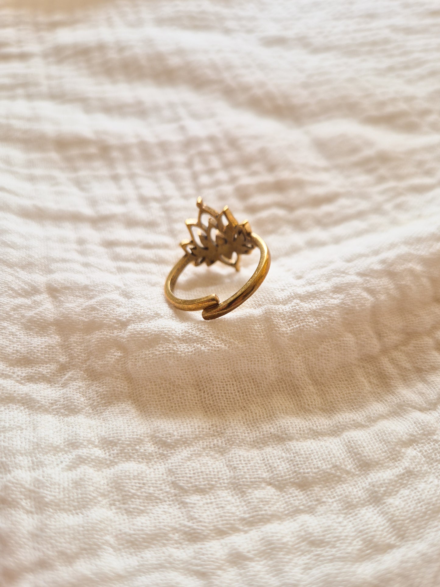 The lotus adjustable brass ring