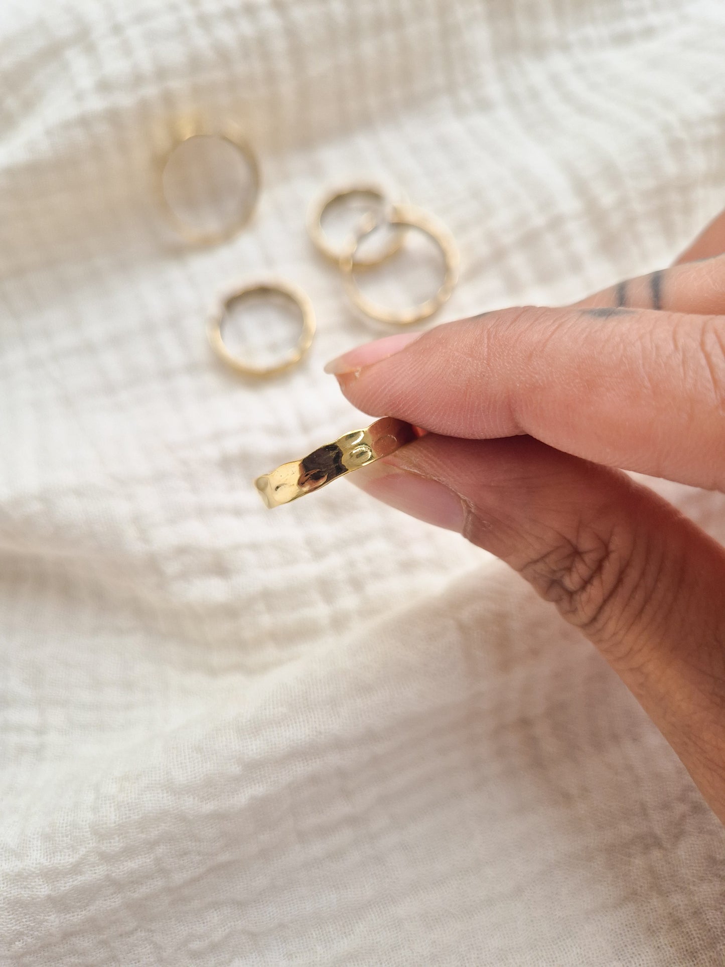 Dhara hammered band brass ring