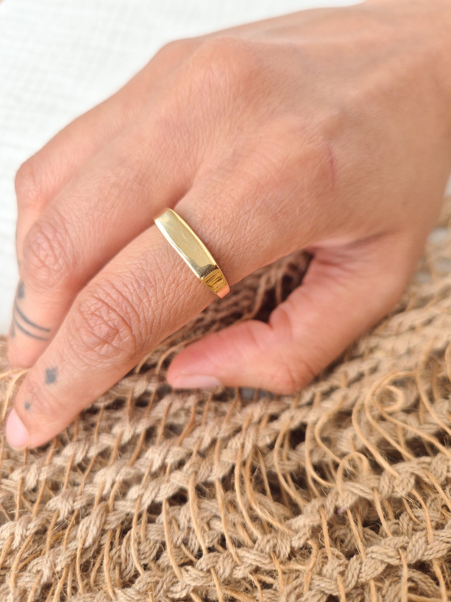 Aadi flat band brass ring