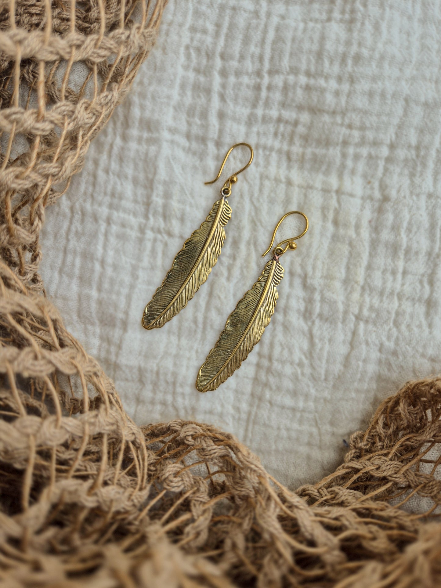 Oona feather brass earrings
