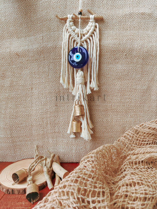 Evil eye cow bell macrame wall hanging