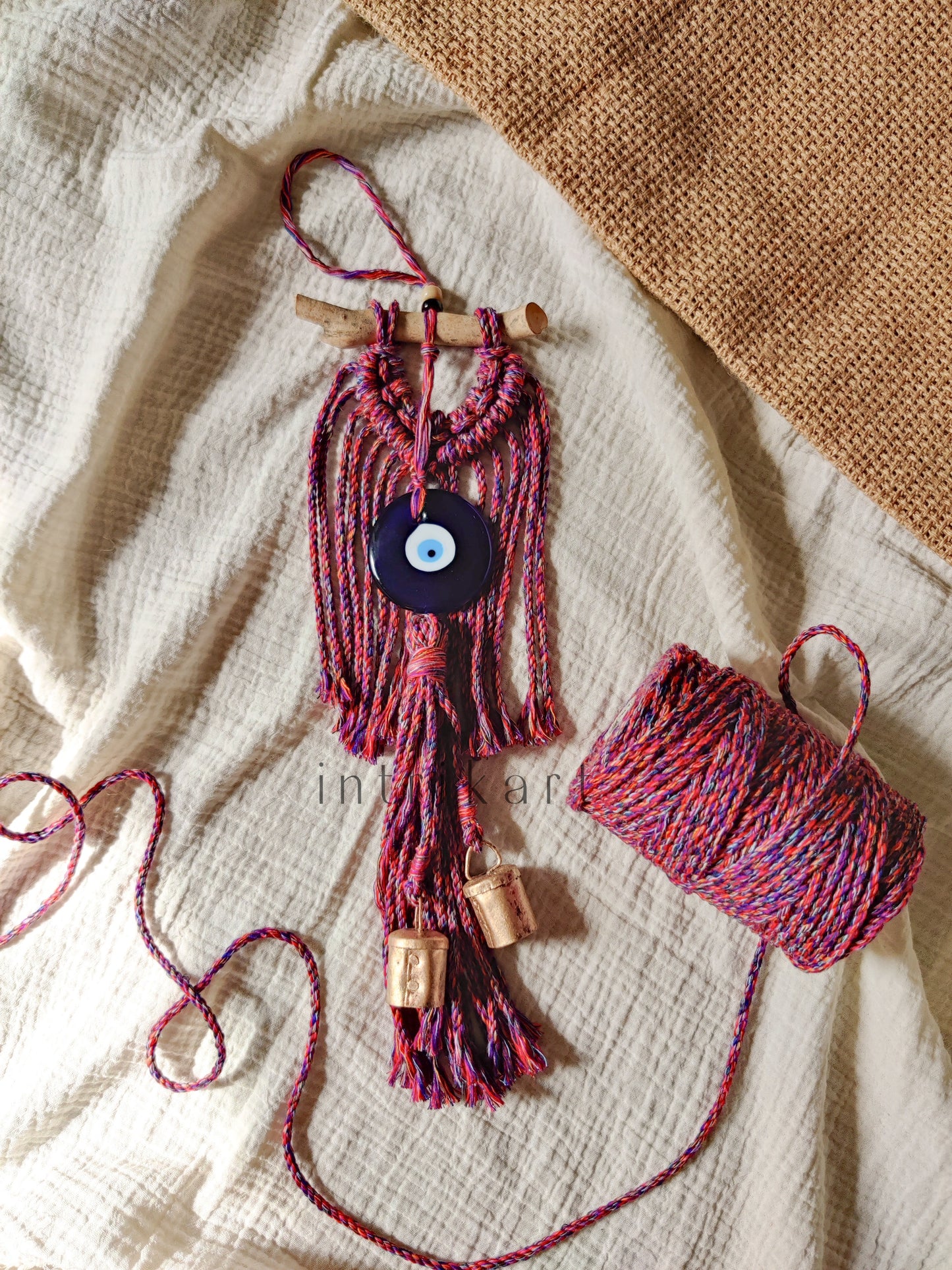 Evil eye cow bell macrame wall hanging